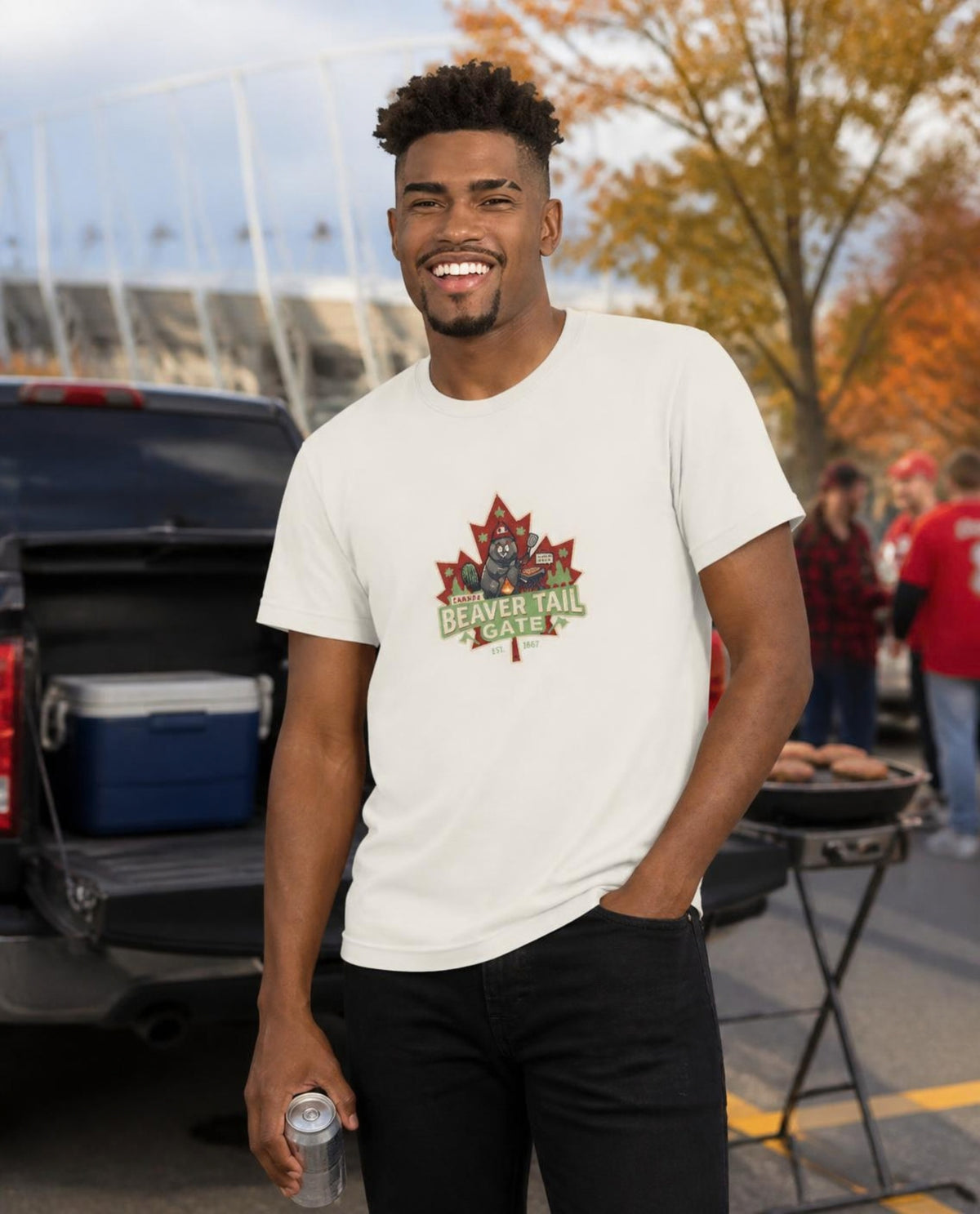 Man wearing a vintage white Beaver Tail Gate t-shirt at a stadium tailgate party