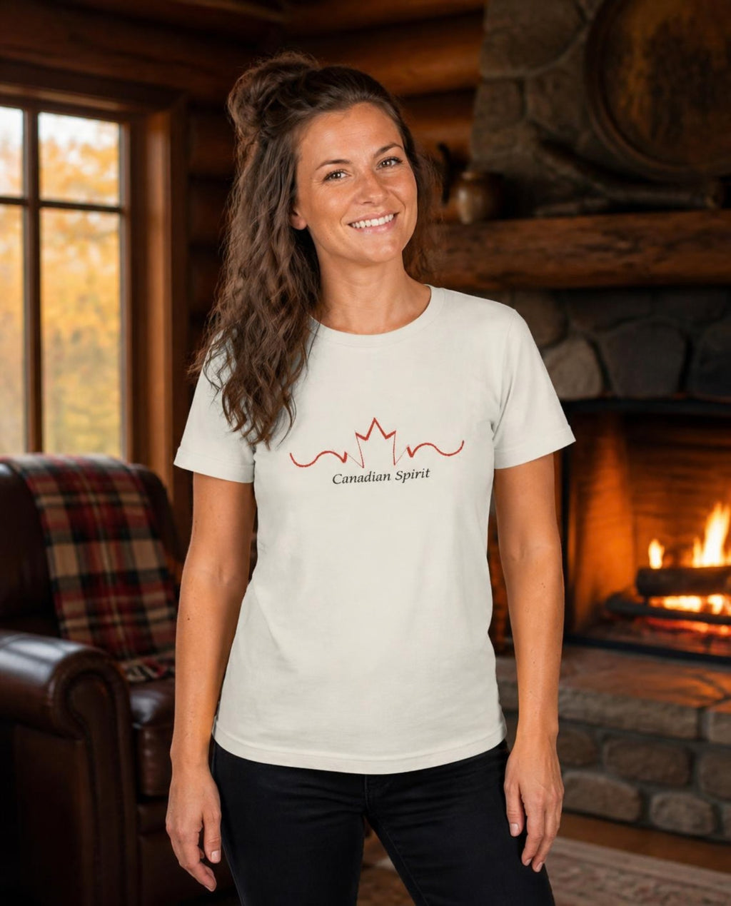 Woman wearing a vintage white Canadian Spirit t-shirt by a lodge fireplace