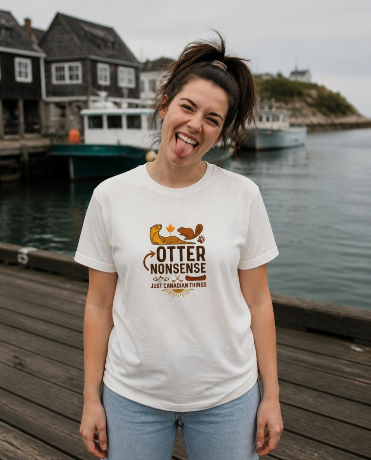 Woman wearing a vintage white Otter Nonsense t-shirt on a harbour pier