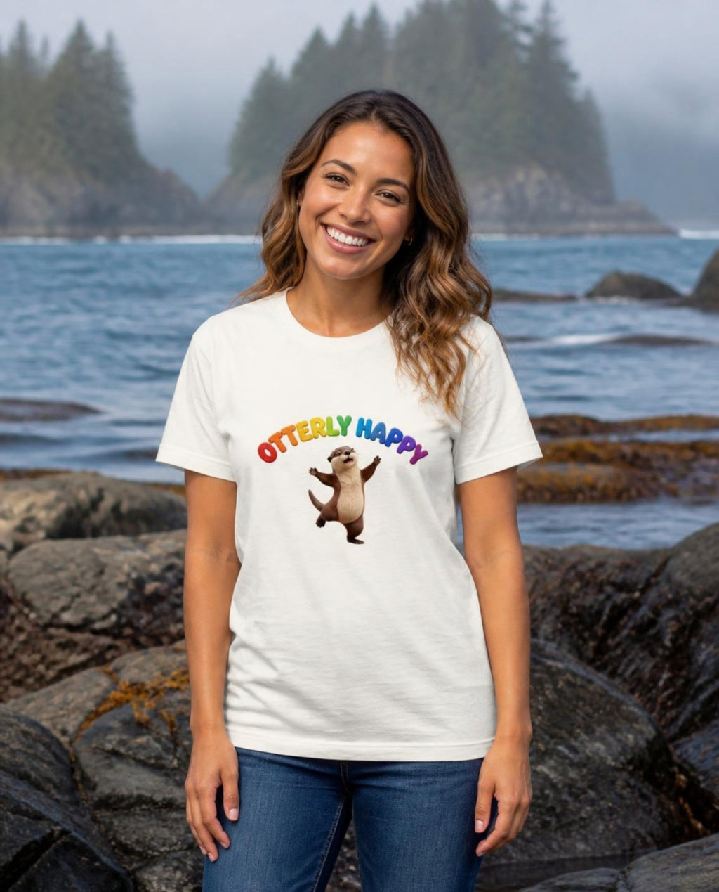 Woman wearing a vintage white Otterly Happy t-shirt on a rocky West Coast shoreline