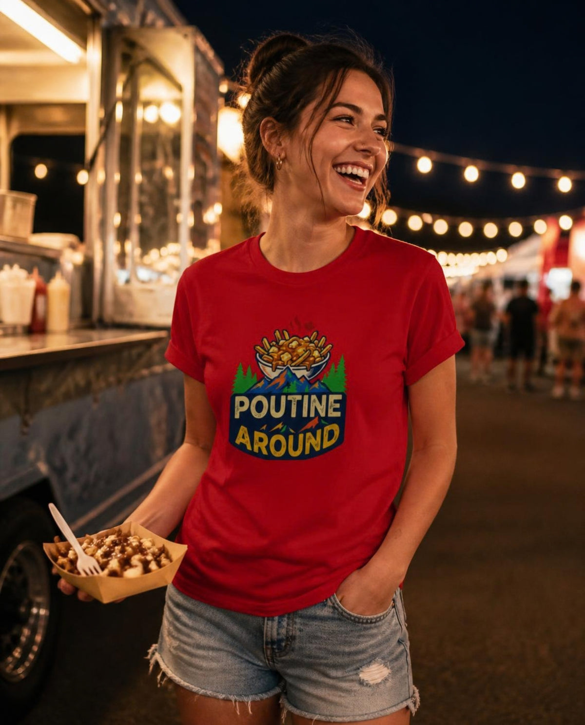 Woman wearing a red Poutine Around t-shirt at a summer night market